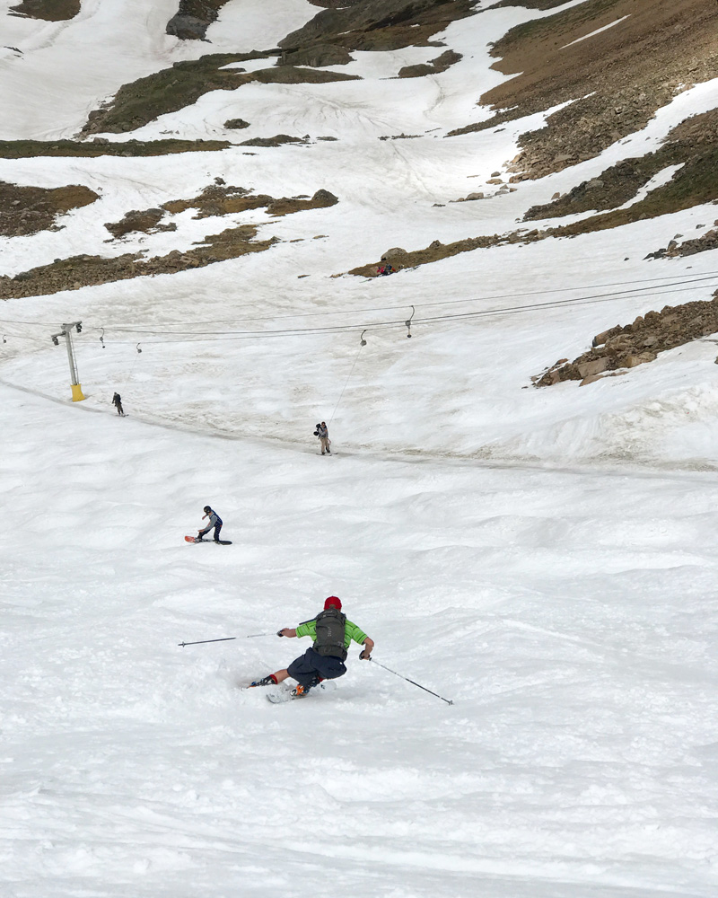 Max skiing the bumps at Beartooth Basin in shorts on July 6, 2019