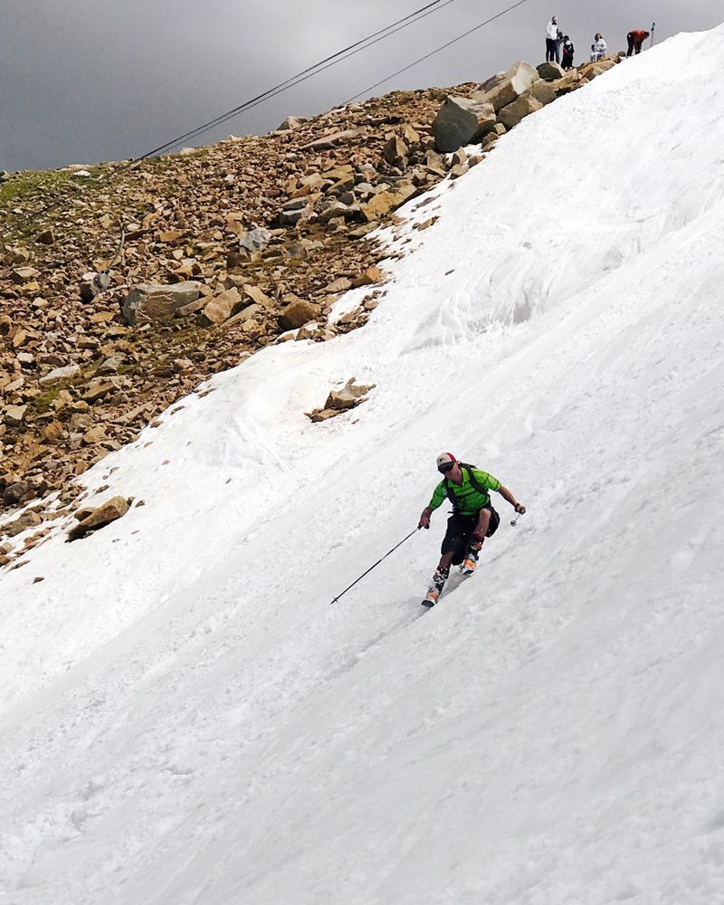 Max skiing in shorts at Beartooth Basin on July 6, 2019