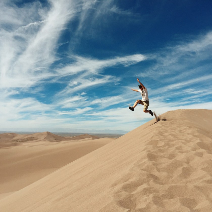 playing in the sand at Great Sand Dunes National Park and Preserve